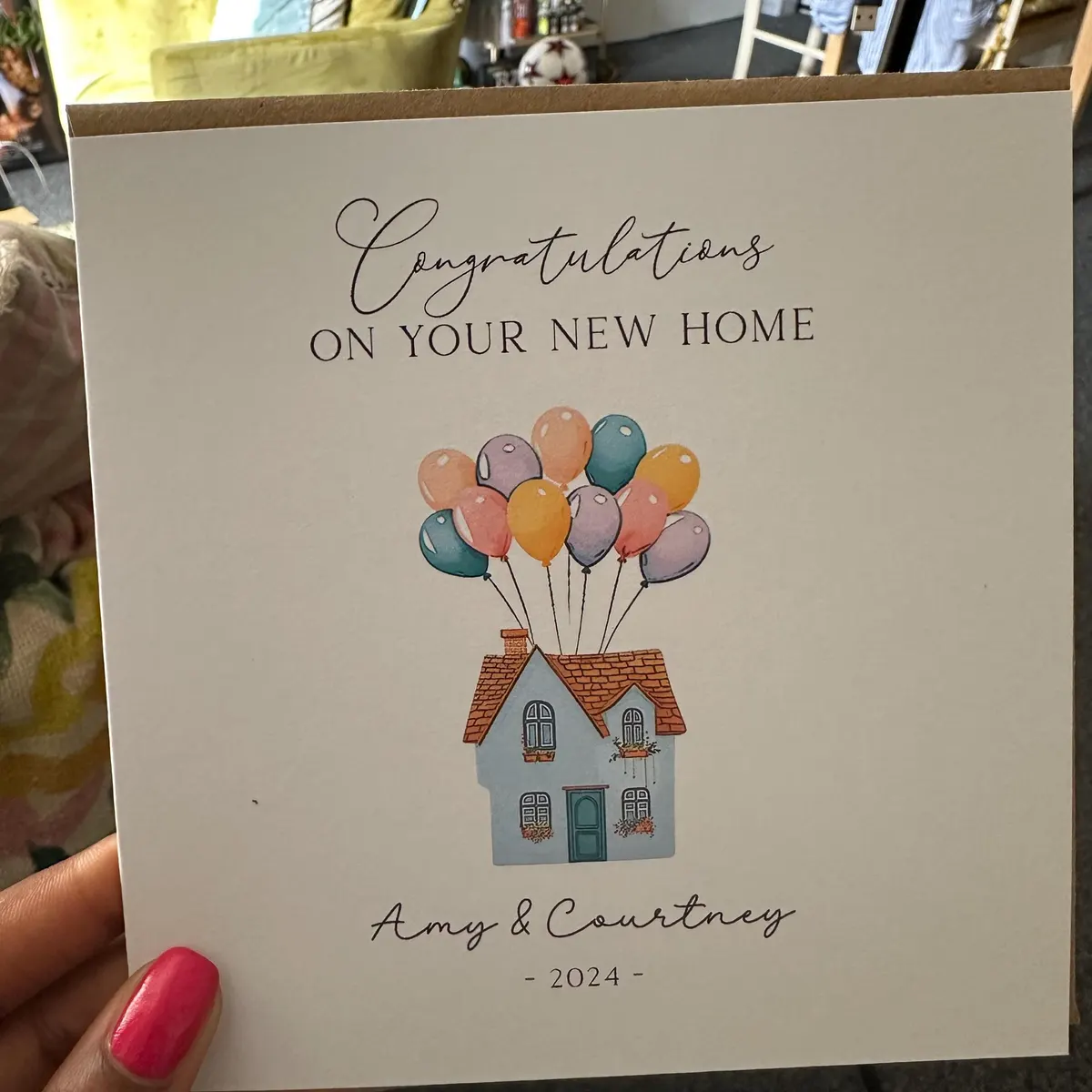Congratulations on your new home card with house and balloons for Amy & Courtney 2024